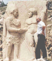Hercules shakes hand of the king